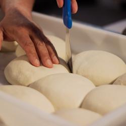 Raschietto per pizza triangolare