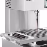 Tempéreuse à chocolat / Chocotemper - 12 kg - 2,5 kW - avec robinet de vidange - incl. surface de rangement avec zone de glaçage