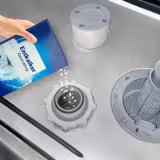 Genomgångsdiskmaskin 7,1 kW - Utan avloppspump - Med diskmedelspump och sköljmedelstillförsel (dubbelväggig) - Med avkalkningsmedel + inlopps- och utloppsbord till höger