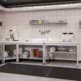 Edelstahl Arbeitstisch PREMIUM - 1200x600mm - mit Grundboden, Aufkantung & Rollen